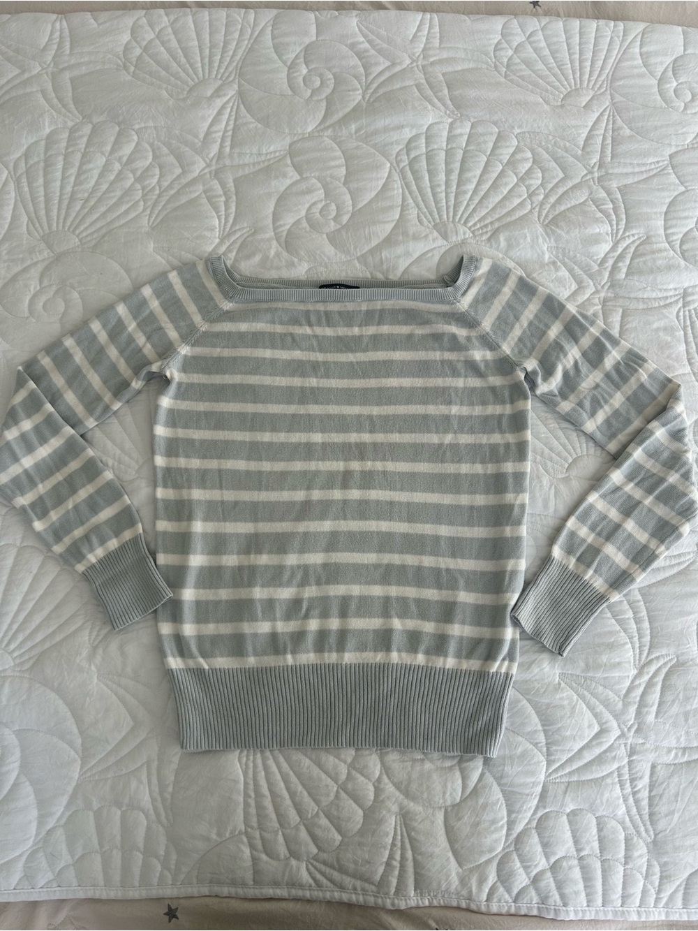 Brandy Melville Off-the-Shoulder Striped Sweater in Light Gray and White.